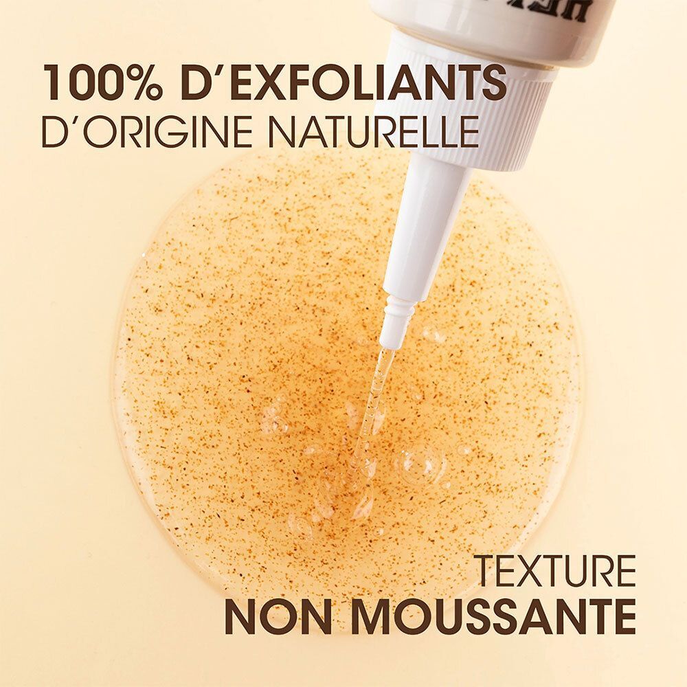 Flacon avec bec verseur. Liquide qui coule. Inscription: HEI POA, Tahiti Detox, Gel exfoliant. Texte: Non moussant.