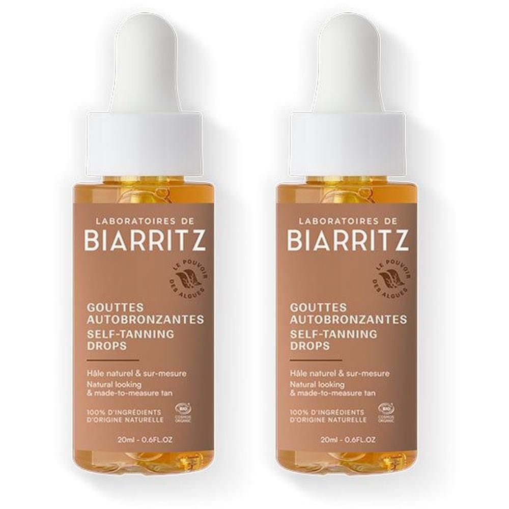 Deux flacons avec pipette. Inscription: LABORATOIRES DE BIARRITZ, GOUTTES AUTOBRONZANTES, SELF-TANNING DROPS. Liquide brun.