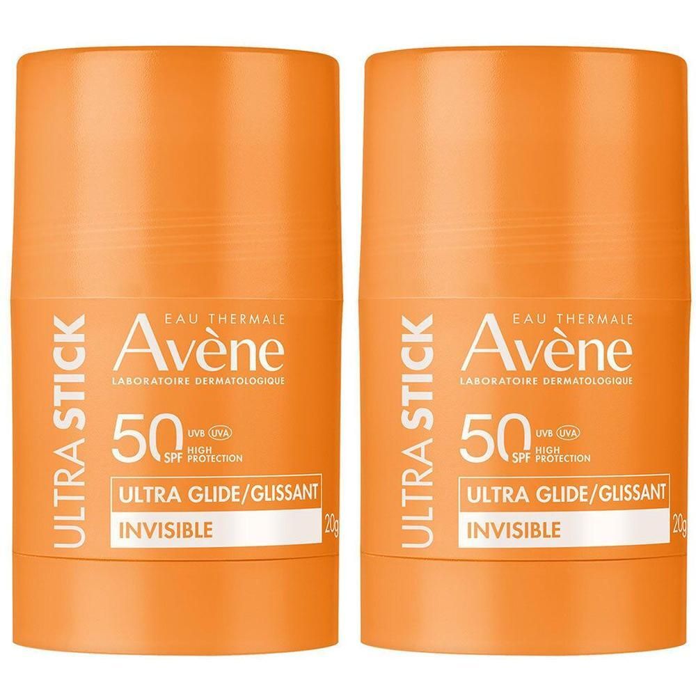 Deux sticks solaires orange. Inscription: Avene Ultra Stick 50 SPF. Texte: Ultra Glide/Gussant Invisible. 20g.