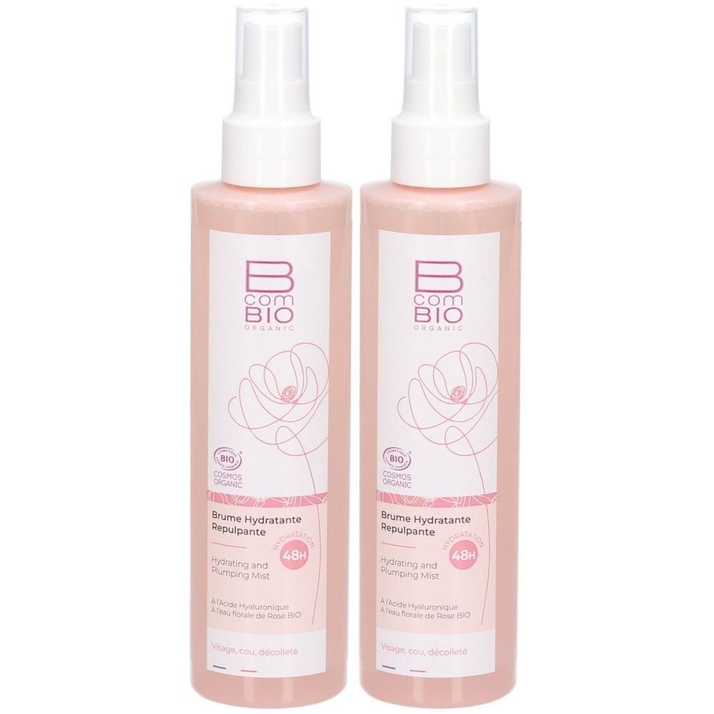 Deux flacons spray roses avec vaporisateur blanc. Inscription: B-COM BIO ORGANIC, Brume Hydratante Repulpante, 48h.