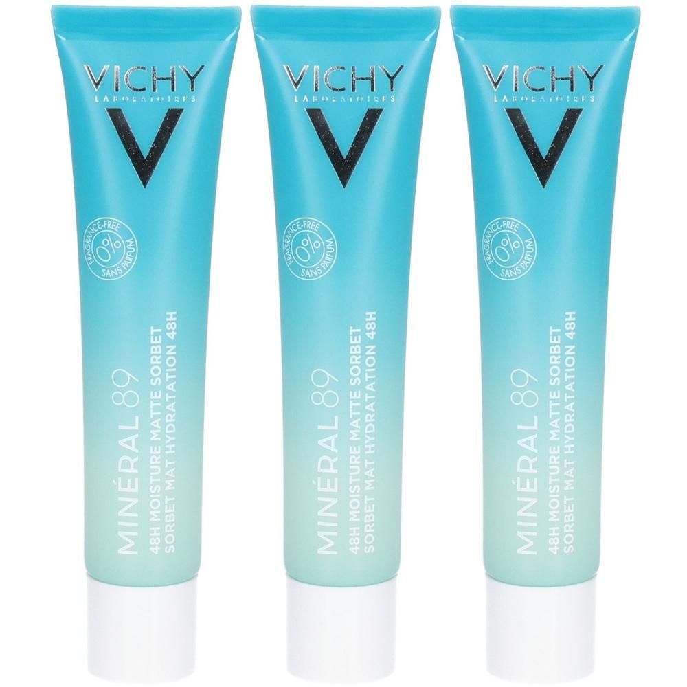 Trois tubes bleus clairs avec bouchons blancs. Inscription "VICHY" et "MINERAL 89". Texte: 48H MOISTURE MATTE SORBET.