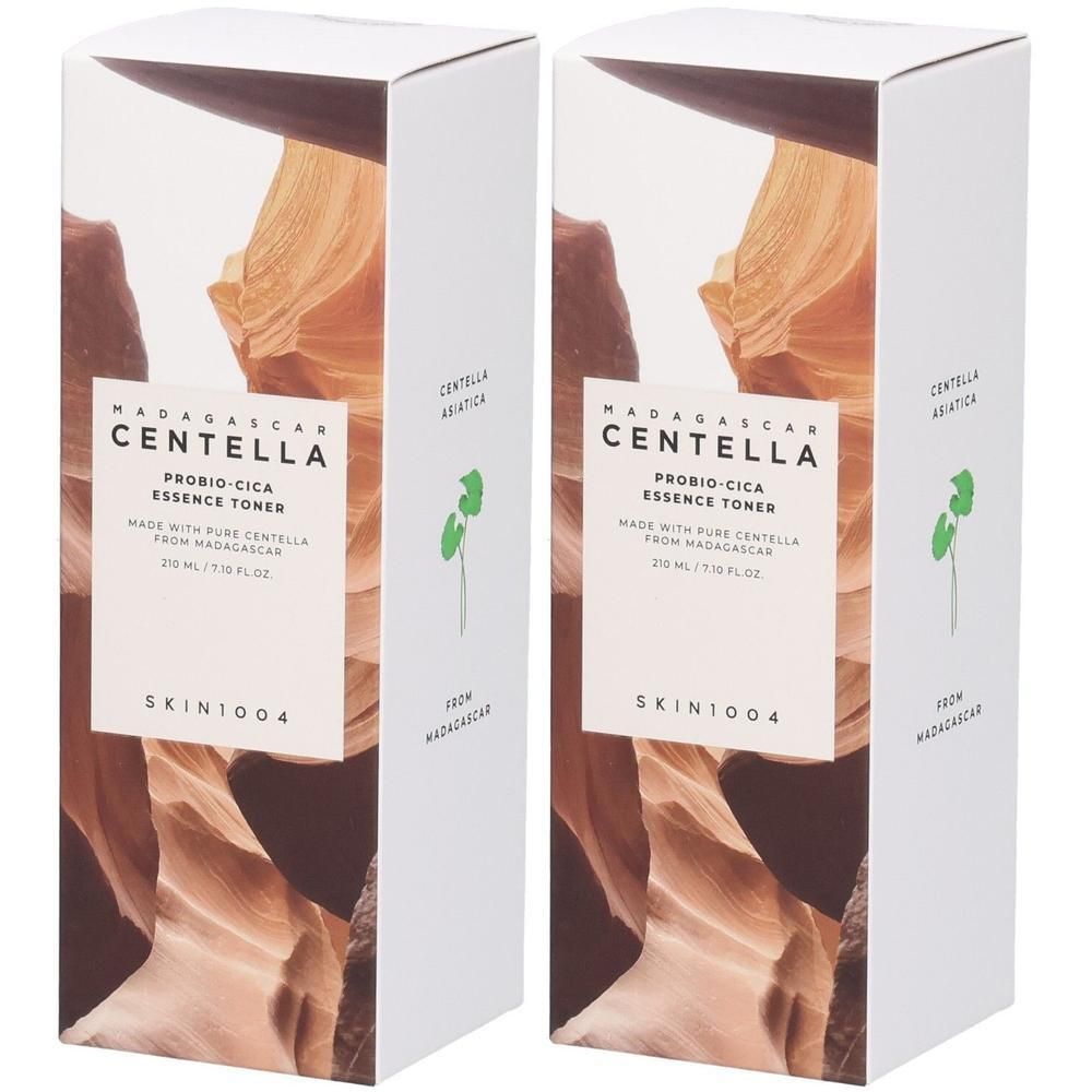 Deux boîtes rectangulaires. Inscription : MADAGASCAR CENTELLA PROBIO-CICA ESSENCE TONER. Marque SKIN1004. Fond : formation rocheuse brune.
