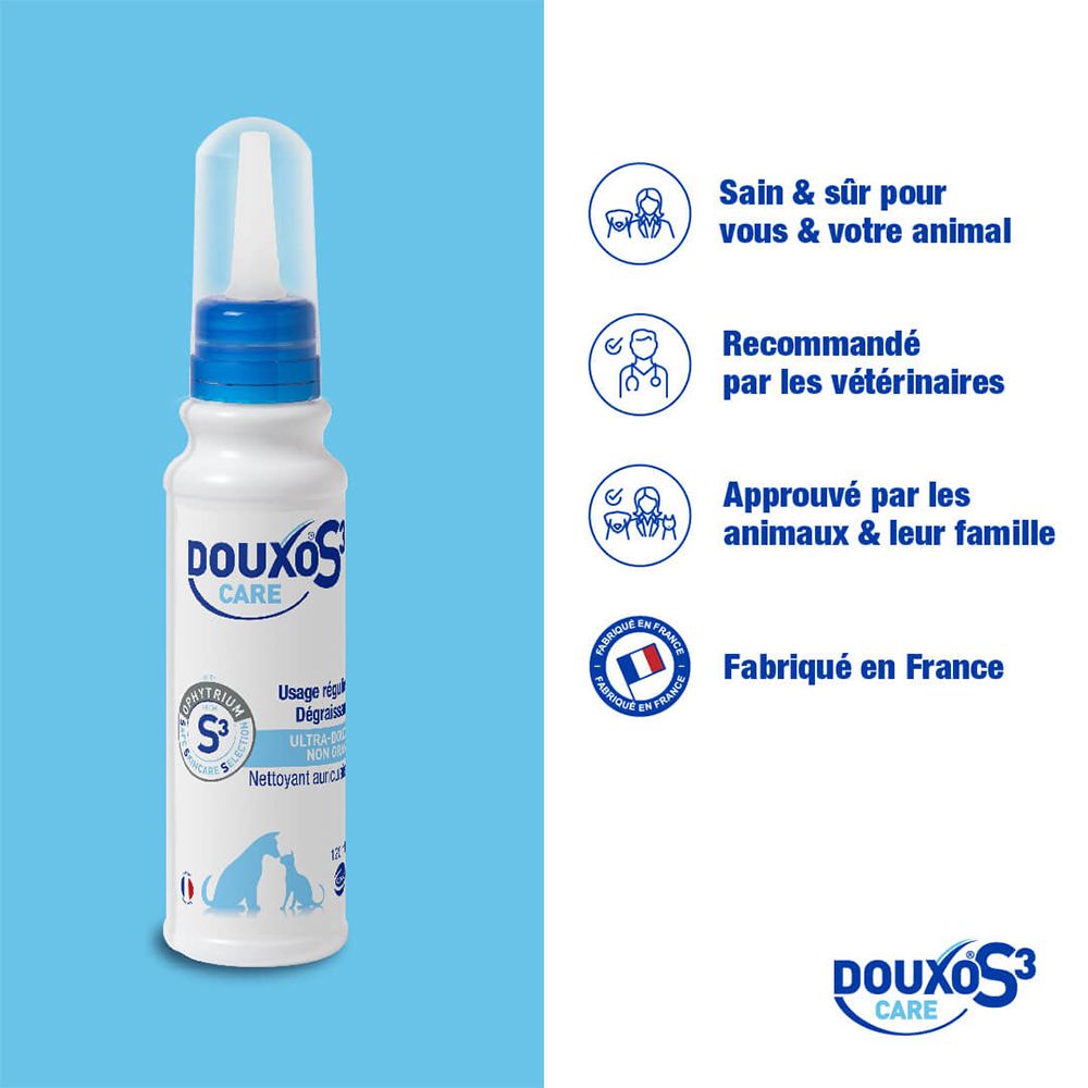 Flacon de nettoyant auriculaire DOUXO S3 CARE avec infographies sur la sécurité et l'origine (France).