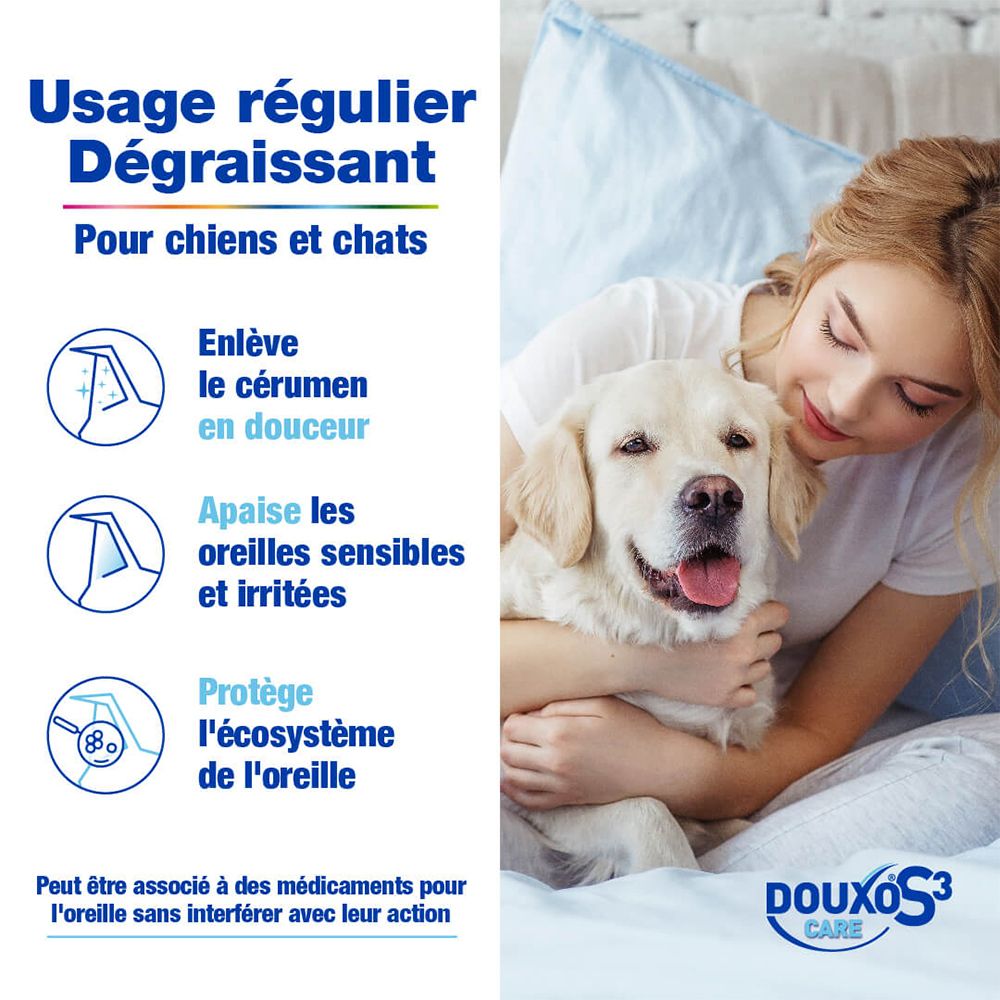 Femme câlinant un chien, avantages du nettoyant auriculaire DOUXO S3 CARE : enlève le cérumen, apaise, protège.
