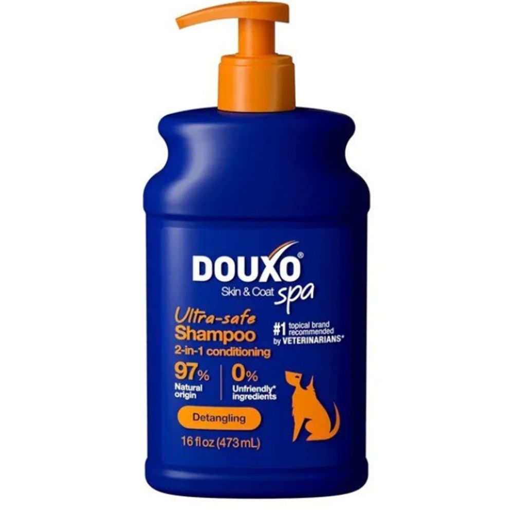 DOUXO SPA Shampoing & Après-shampoing 2-en-1. Flacon bleu avec distributeur à pompe orange.