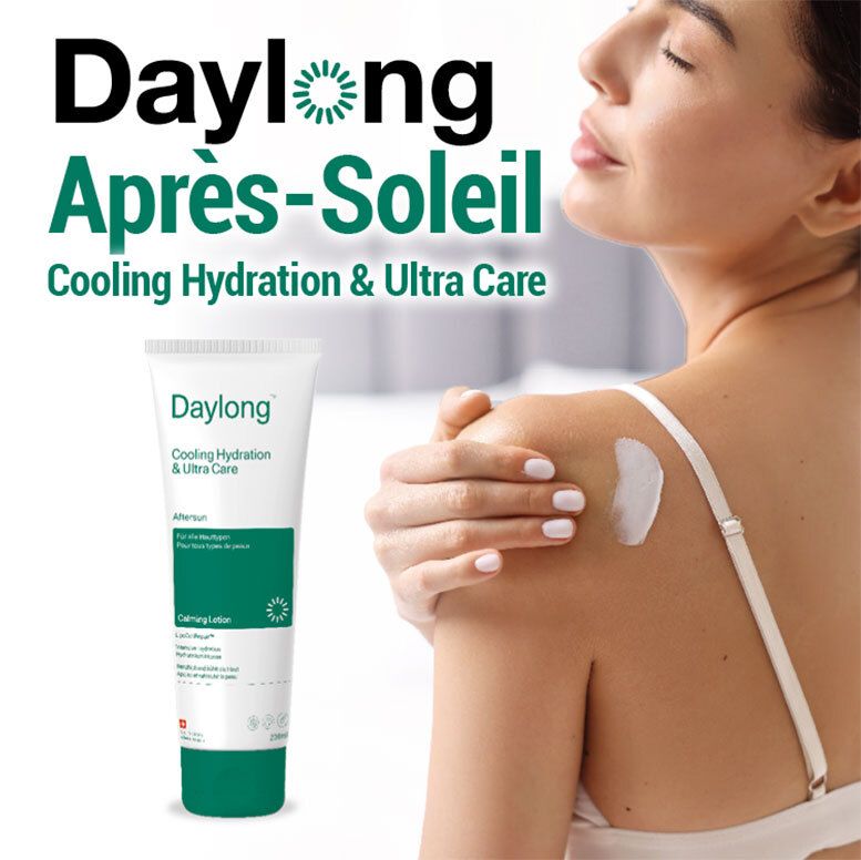 Tube Daylong Après-Soleil sur l'épaule d'une femme. Soin hydratant et ultra-protecteur pour la peau.