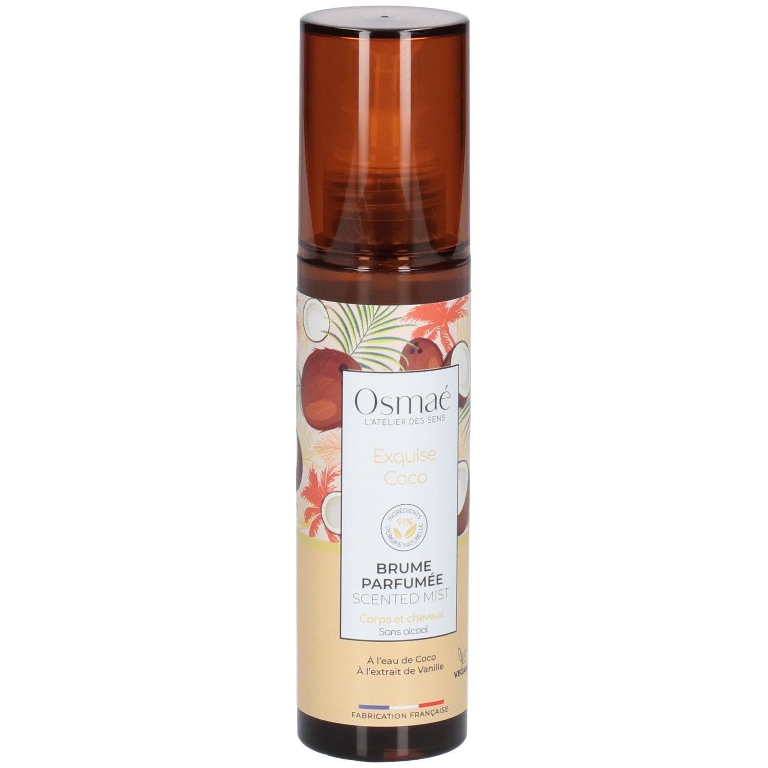 Flacon Osmae Exquise Coco Brume Parfumée avec tête de pulvérisation marron et étiquette à motifs de noix de coco.