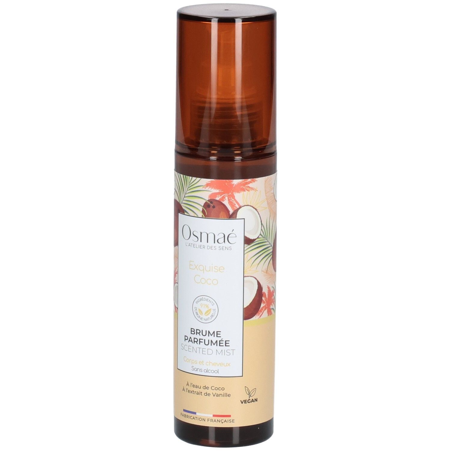 Flacon Osmae Exquise Coco Brume Parfumée avec tête de pulvérisation marron et étiquette à motifs de noix de coco.