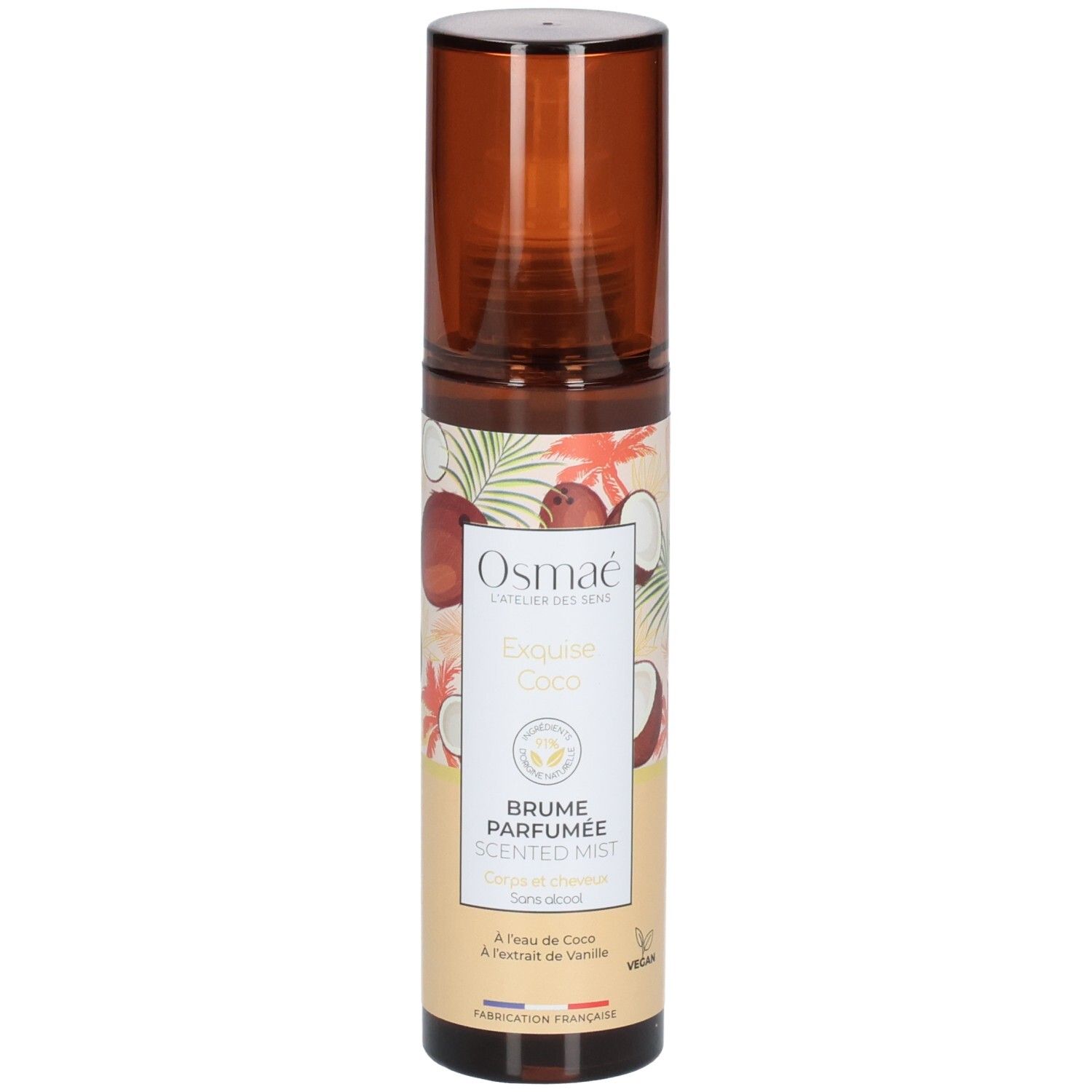 Flacon Osmae Exquise Coco Brume Parfumée avec tête de pulvérisation marron et étiquette à motifs de noix de coco.