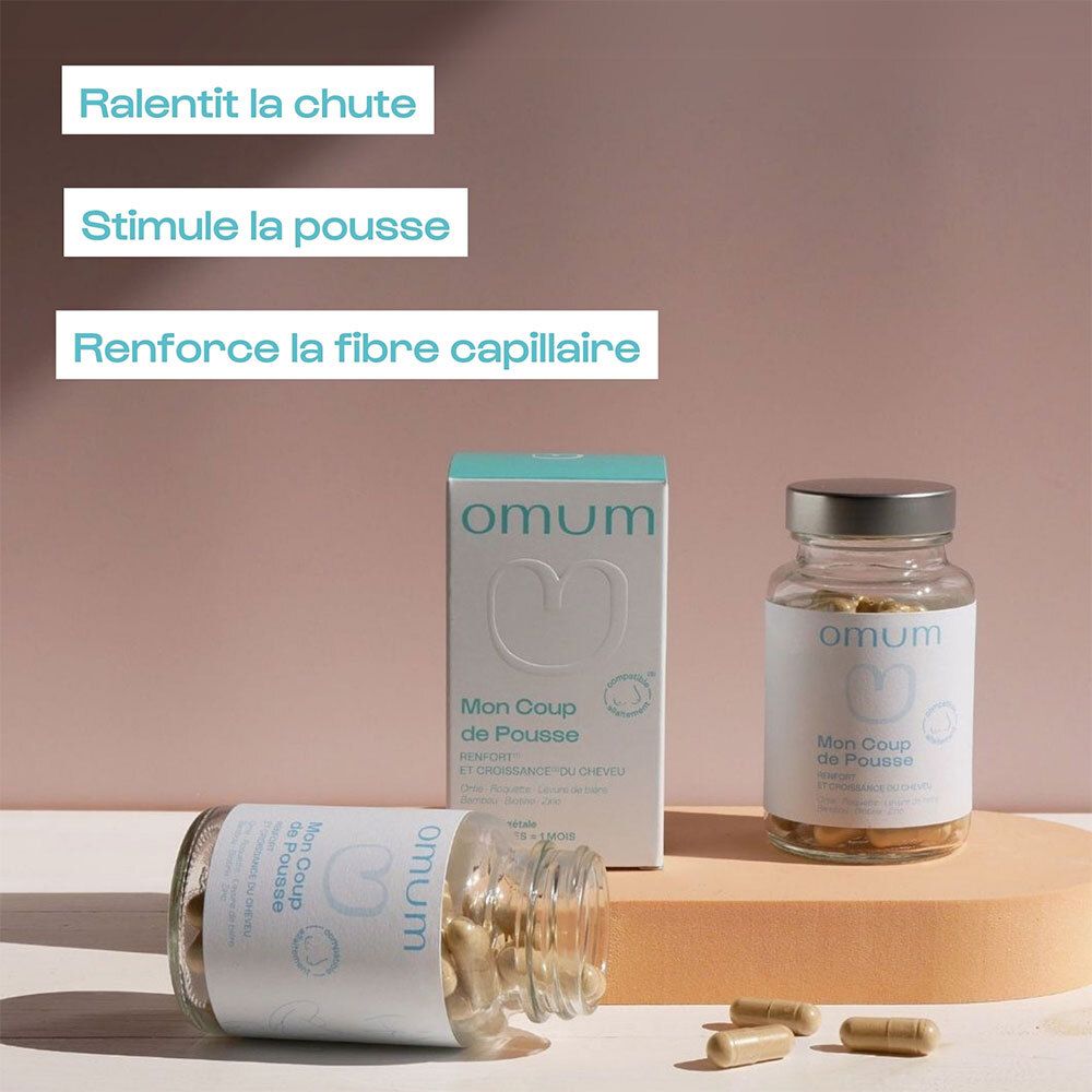 Complément alimentaire Omum pour la pousse des cheveux, flacon et boîte.