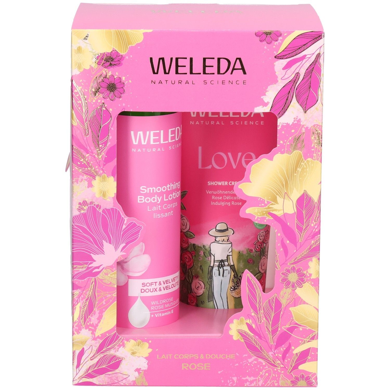 Vue de face d'un coffret cadeau Weleda avec lait corporel et crème de douche, emballage rose.