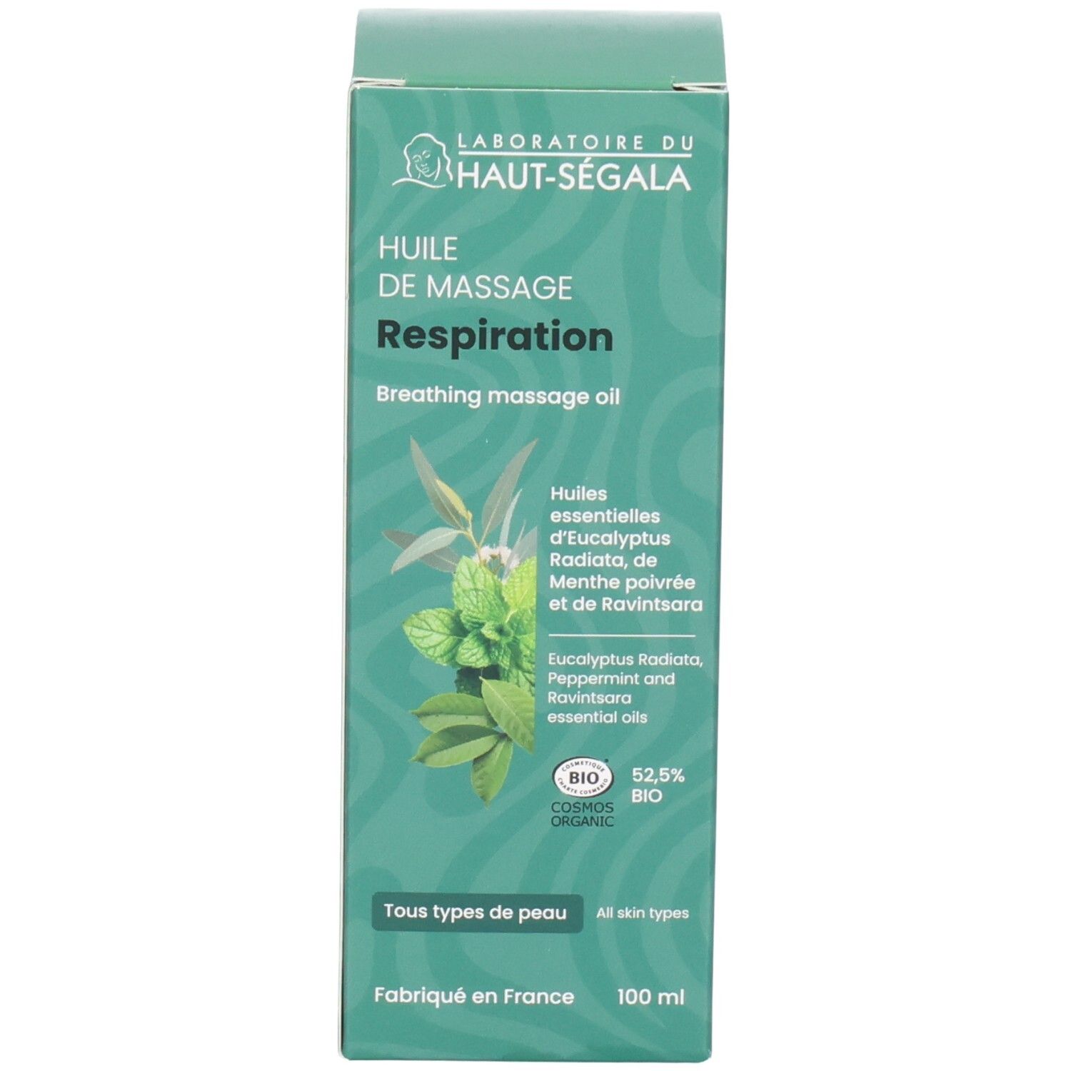 Boîte, emballage vert avec motif végétal, texte et sceaux.