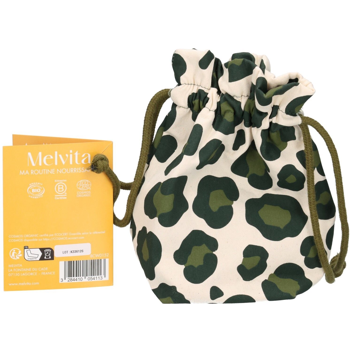 Pochette Melvita à motif léopard, cordon de serrage et notice de soin avec code-barres.