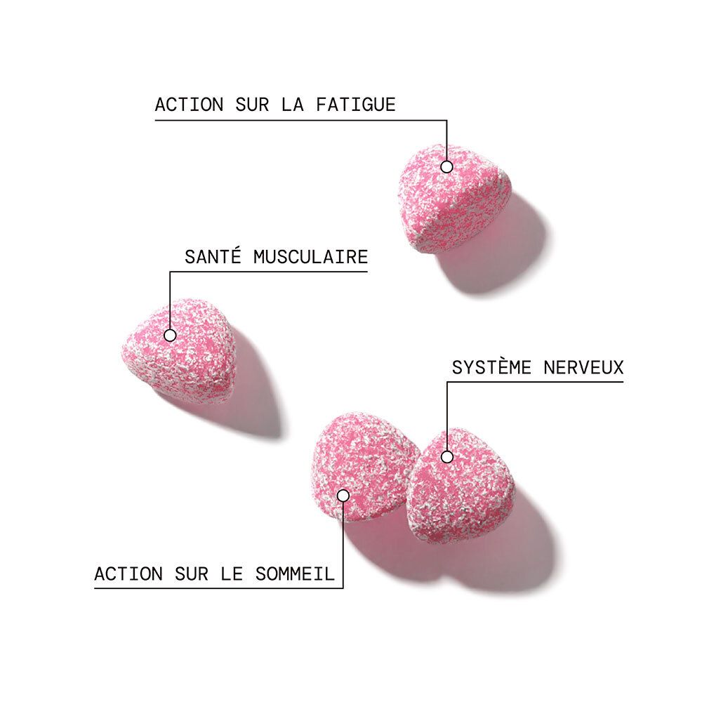 Trois bonbons gélifiés roses pour la santé musculaire et le sommeil.