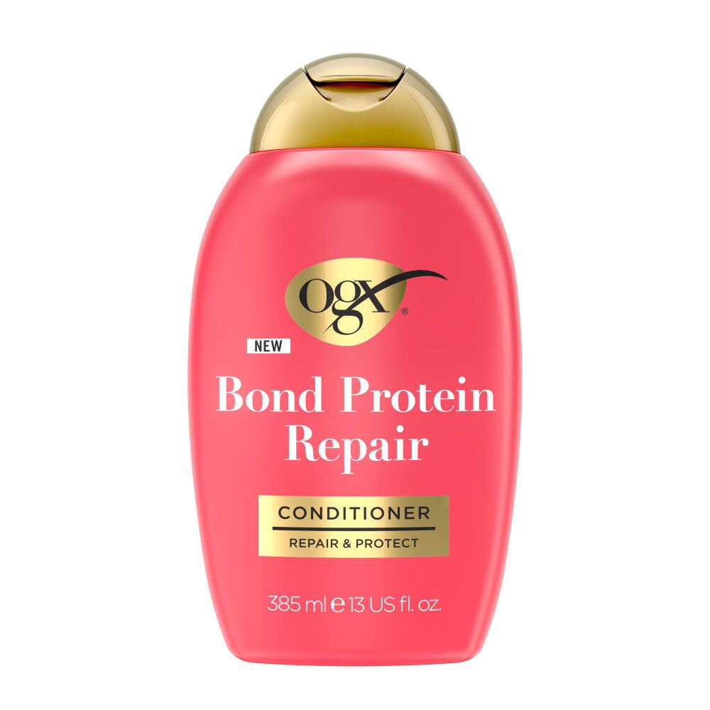 OGX Bond Protein Repair Conditioner dans une bouteille rouge avec un bouchon doré. 385 ml.