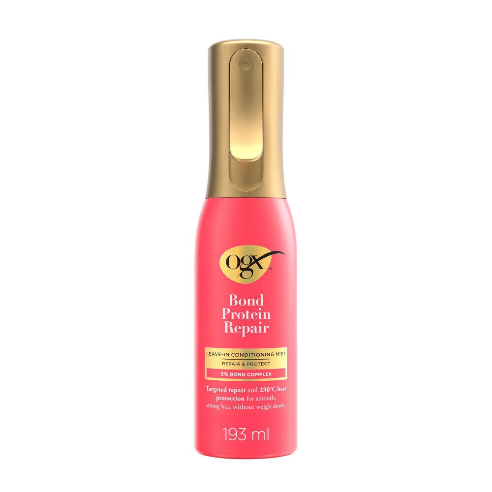 Flacon spray rouge avec tête de pulvérisation dorée. OGX Bond Protein Repair Leave-In Conditioning Mist.