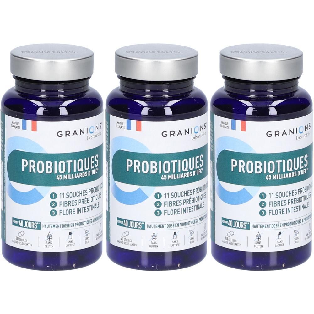 Trois flacons de GRANIONS Probiotiques avec bouchons argentés. Flacons bleus avec étiquette blanche et bleu sarcelle.