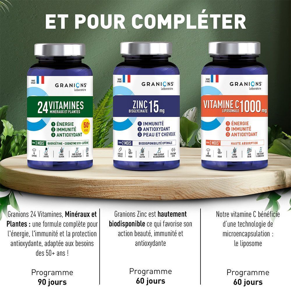 Trois flacons Granions : 24 Vitamines, Zinc et Vitamine C sur un plateau en bois.