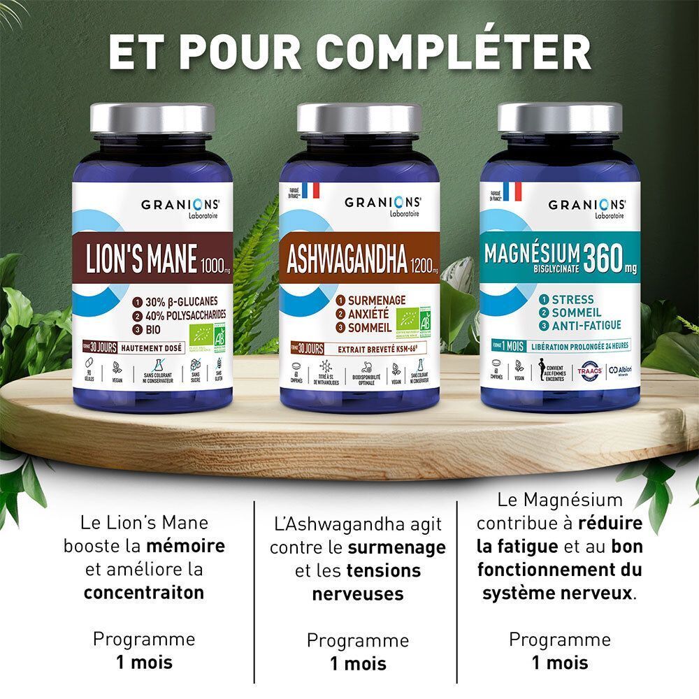 Trois flacons: Granions Crinière de Lion BIO, Ashwagandha 1200, Magnésium 360 mg sur une table en bois.
