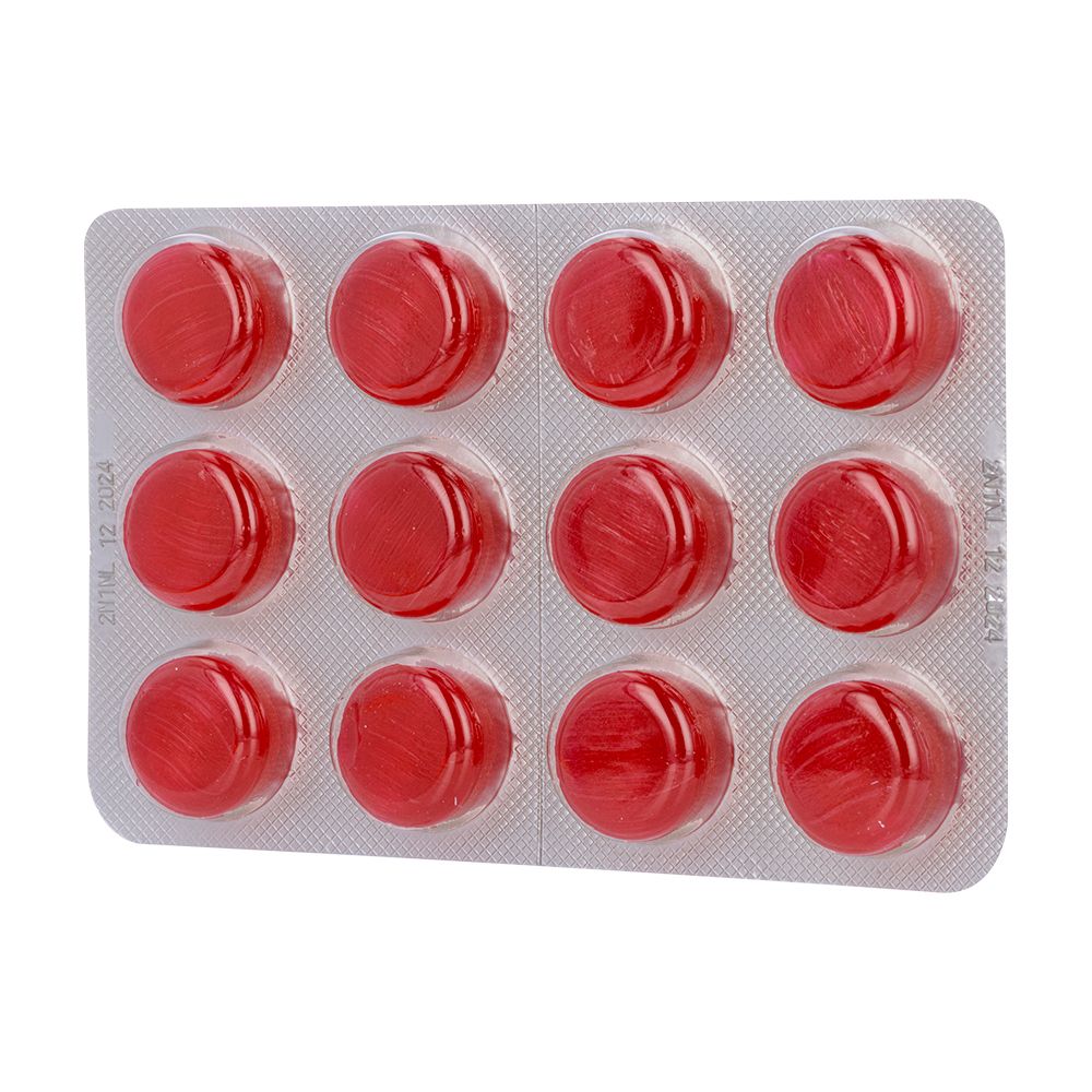 Plaquette de 12 pastilles Drill rouges. Chaque pastille est ronde.