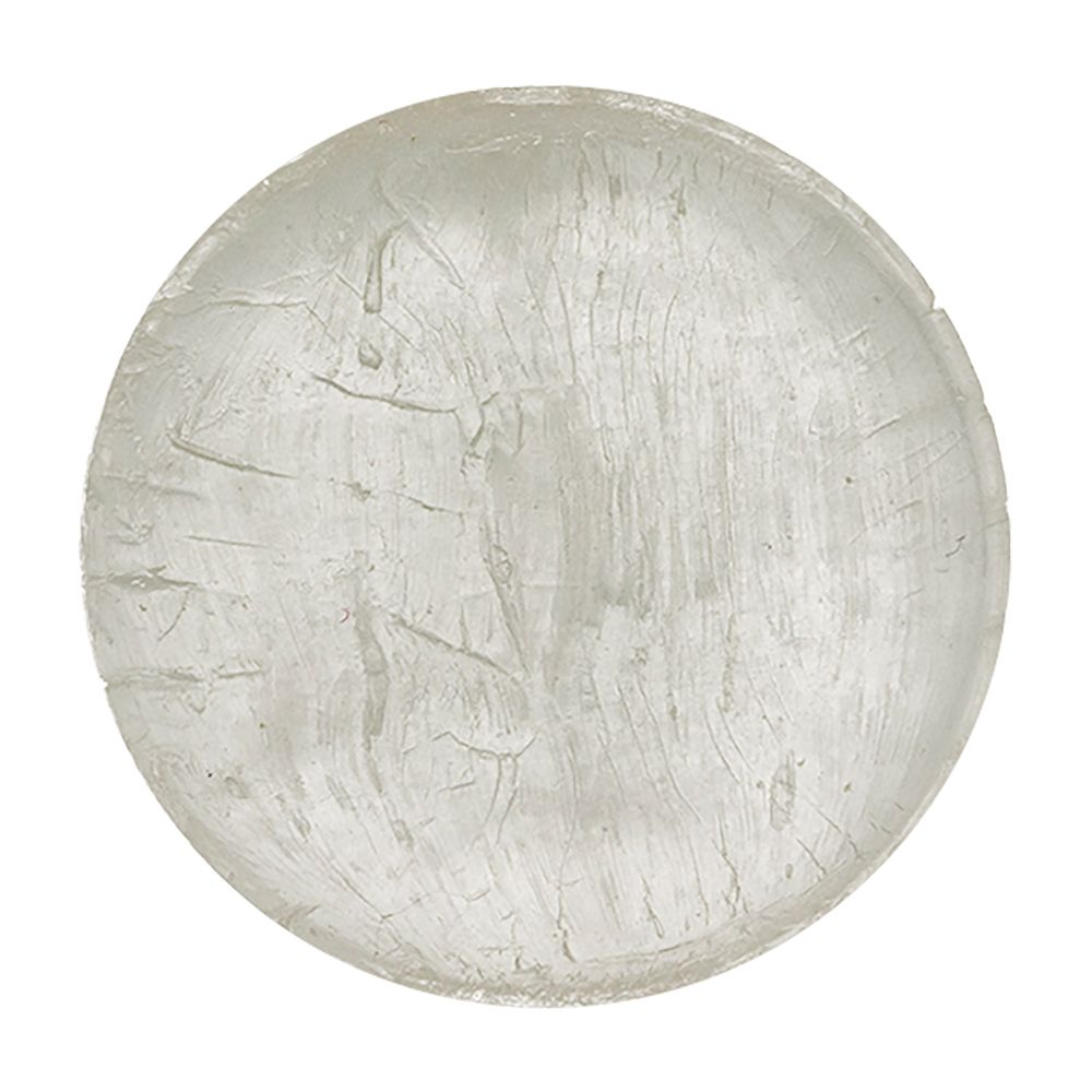 Pastille ronde transparente. Surface craquelée.