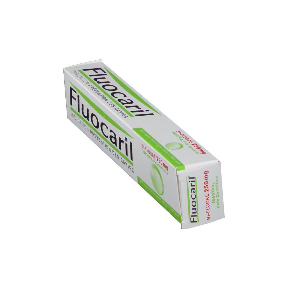 Boîte de dentifrice en biais, blanche et verte. Inscription Fluocaril, Indication Prévention des Caries. Bi-Fluoré 250mg.