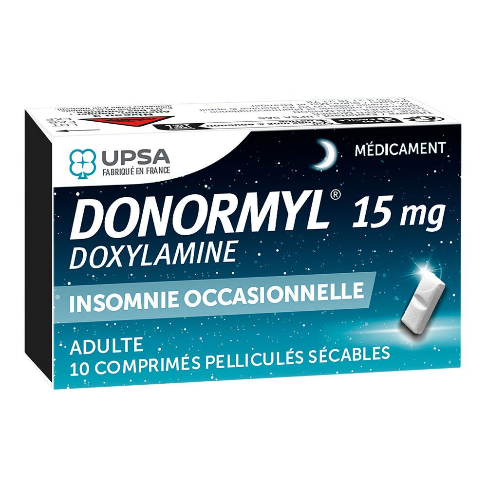 Boîte de DONORMYL 15 mg. Scène de nuit bleue avec lune et étoiles. 10 comprimés. Logo UPSA. Inscriptions en français.