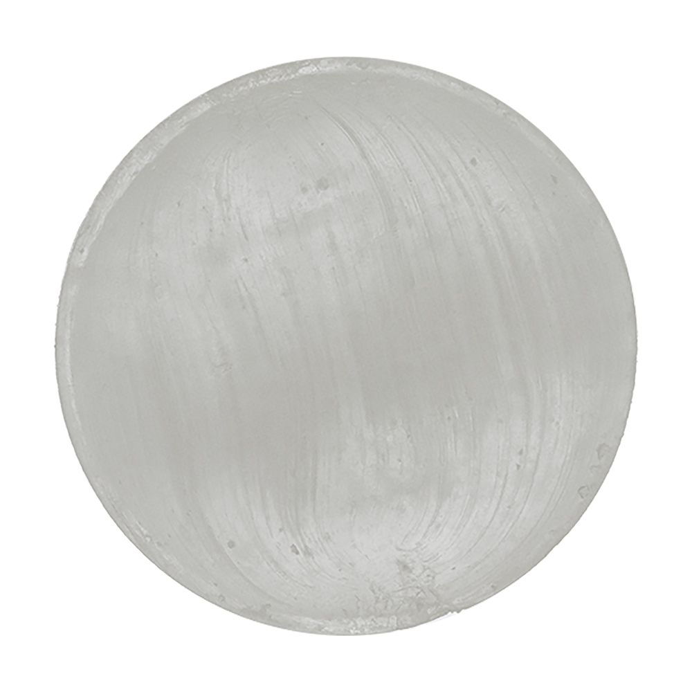 Pastille ronde et transparente. Vue rapprochée. Surface lisse.