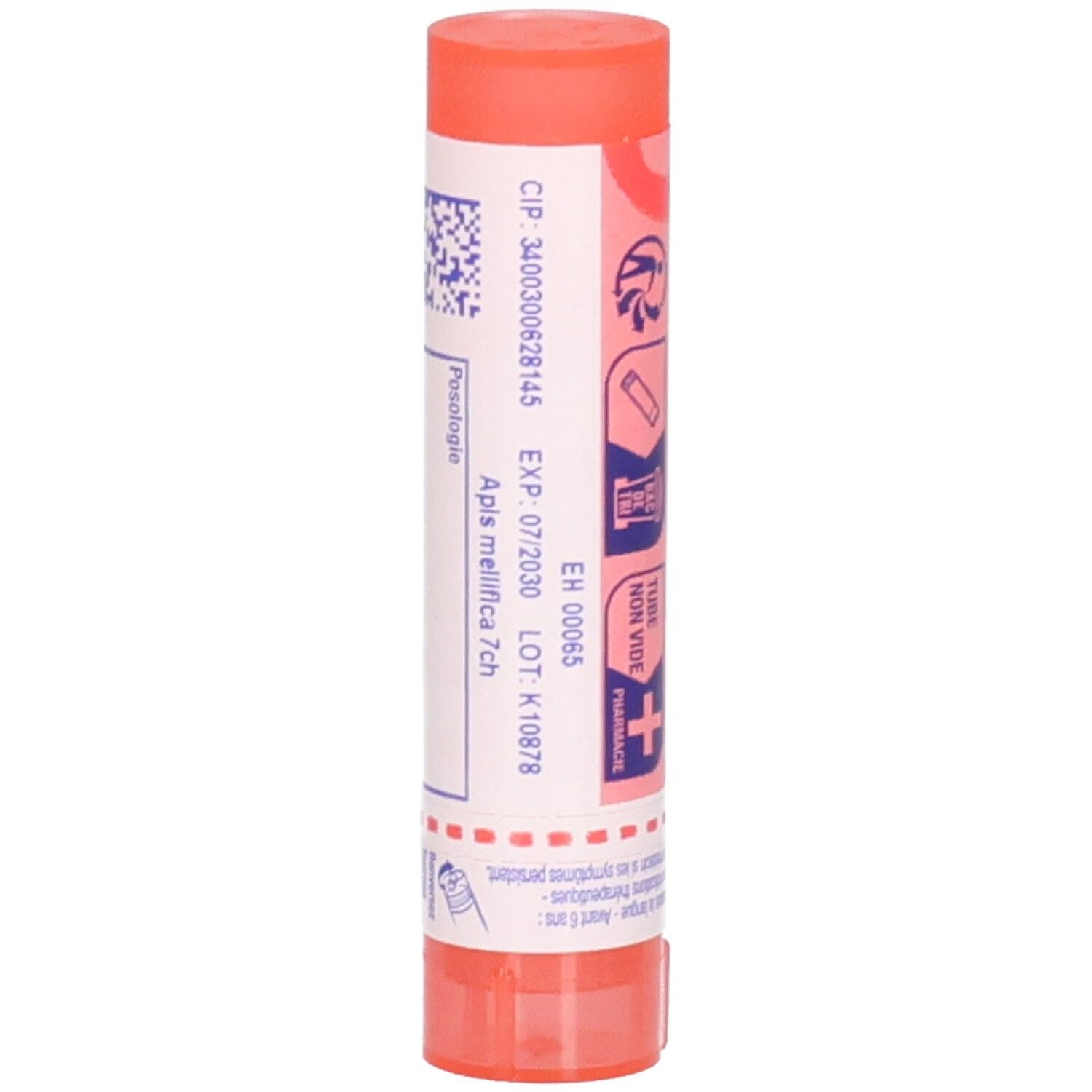 Tube cylindrique, rouge et blanc. Inscription: Apis mellifica 7 ch. Informations sur le lot et la date d'expiration.