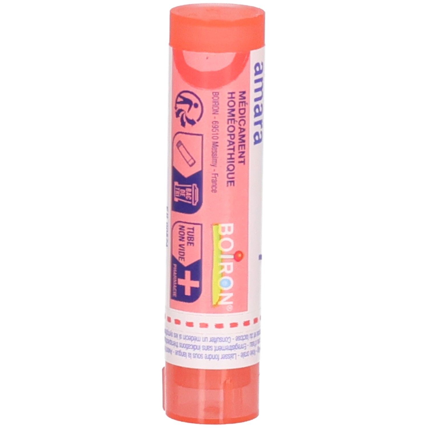 Tube rose-orangé. Inscription: Ignatia amara, 7 ch, Boiron. Médicament homéopathique. Avec symboles.