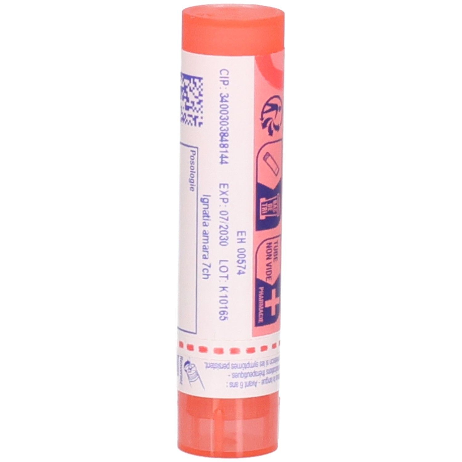 Tube rose-orangé. Inscription: Ignatia amara 7 ch. Médicament homéopathique. Avec code-barres et texte.
