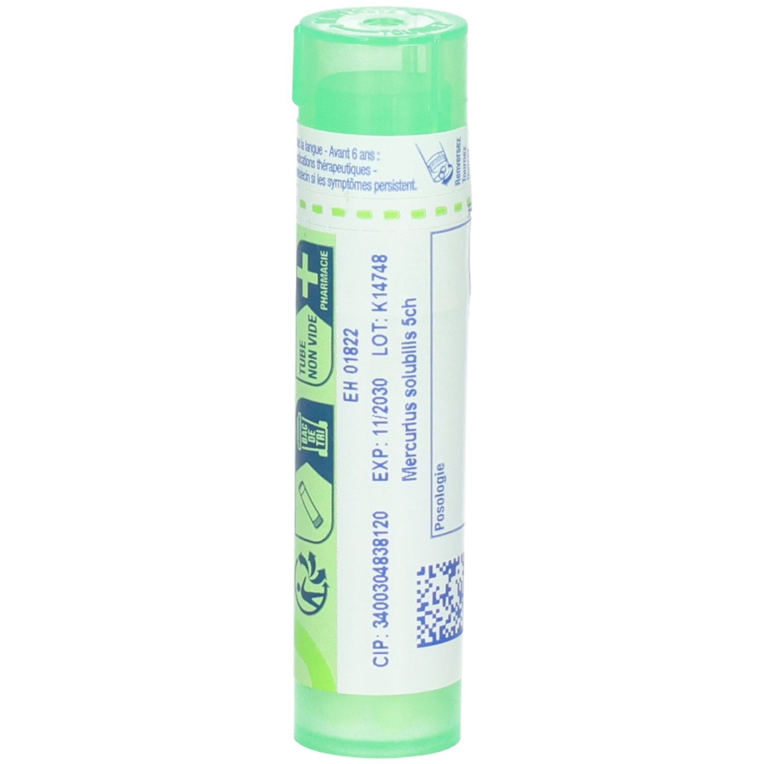 Tube vert avec granules, verso avec numéro de lot et date d'expiration.
