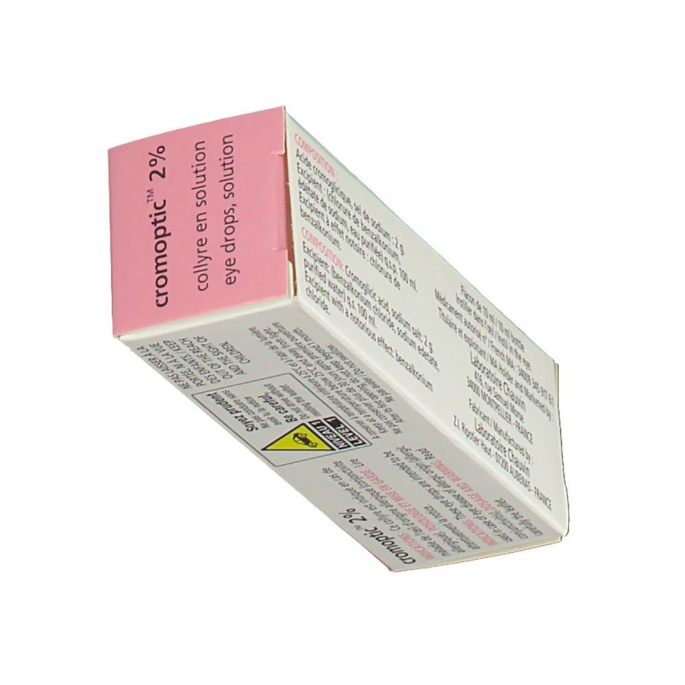 Boîte rose et blanche avec informations produit. Inscription : cromoptic 2 %. Solution ophtalmique. Texte multilingue.