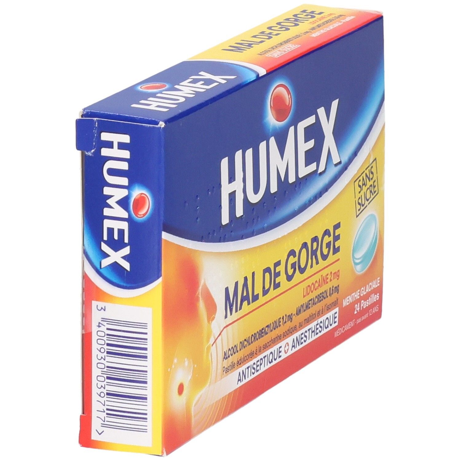 Boîte HUMEX MAL DE GORGE, vue latérale. Inscription: HUMEX, MAL DE GORGE, sans sucre, 24 pastilles. Pastille bleue.