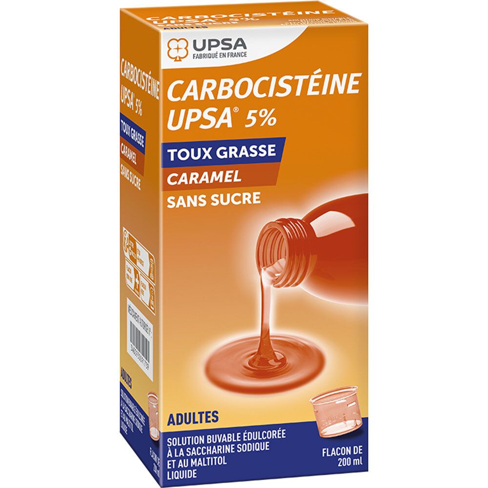 Boîte orange avec nom et logo du produit. Liquide versé dans un récipient. Gobelet doseur.
