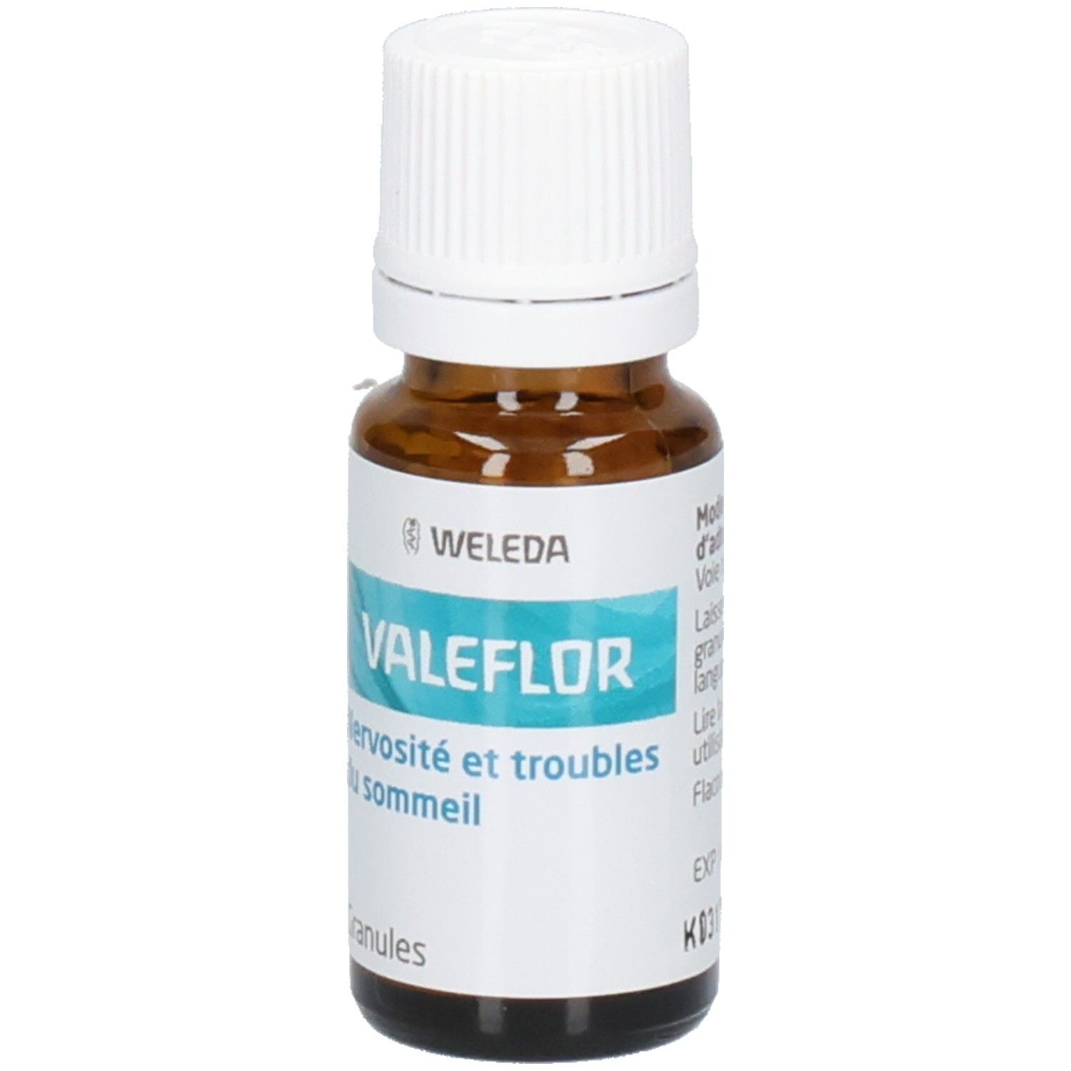 Flacon en verre brun avec bouchon blanc. Étiquette avec informations produit, VALEFLOR, logo WELEDA et Granules.