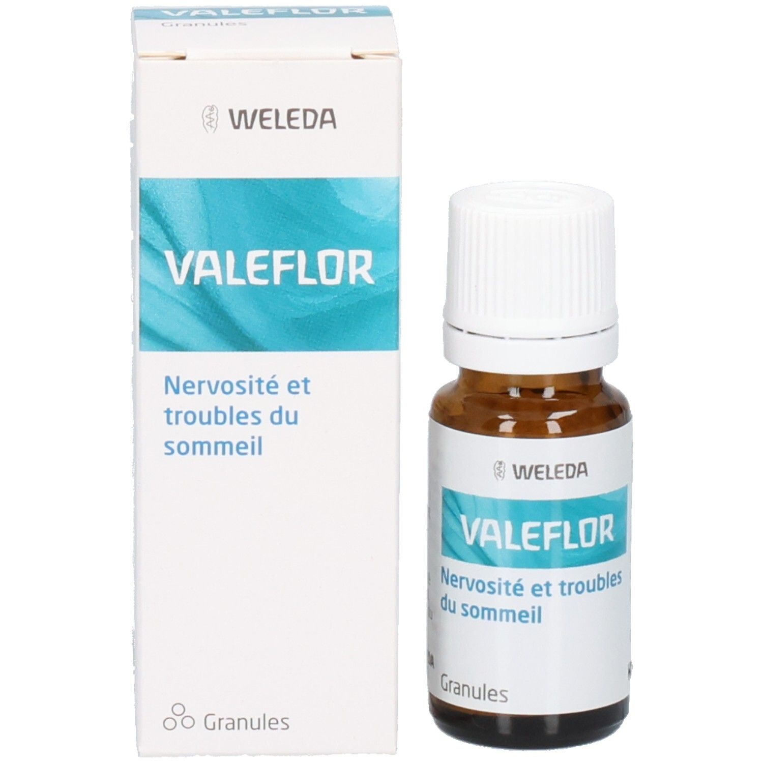 Boîte et flacon VALEFLOR. Boîte blanche avec motif vagues bleues, flacon en verre brun et bouchon blanc.