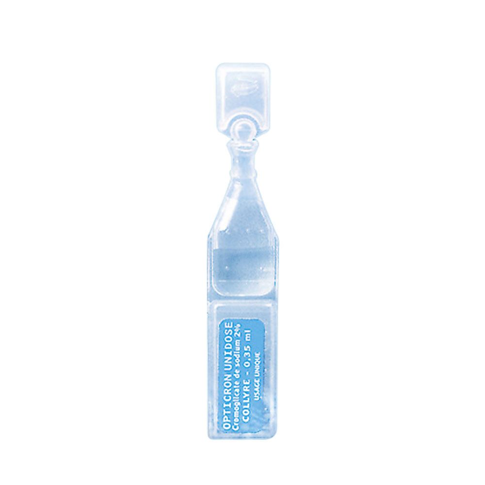 Unidose de collyre. Ampoule plastique transparente, forme goutte. Étiquette bleue avec texte. Contient du liquide.