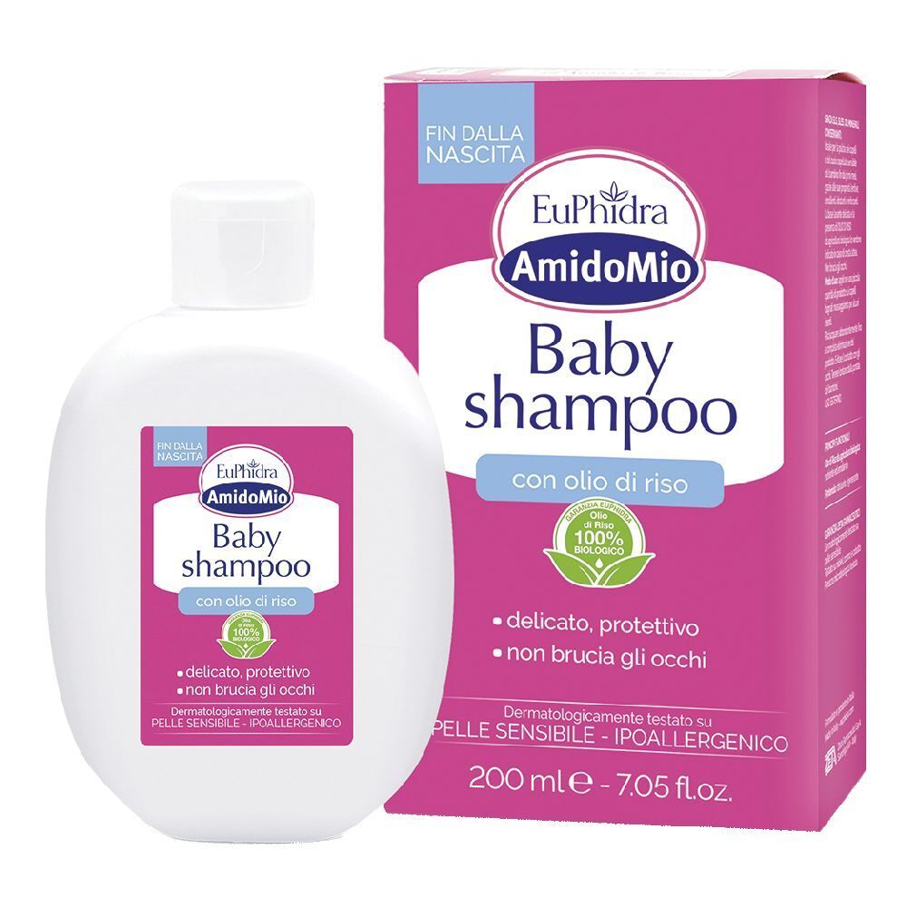 Flacon de shampooing blanc et emballage. Inscription: Euphidra AmidoMio Baby Shampoo. Avec huile de riz. 100% biologique.