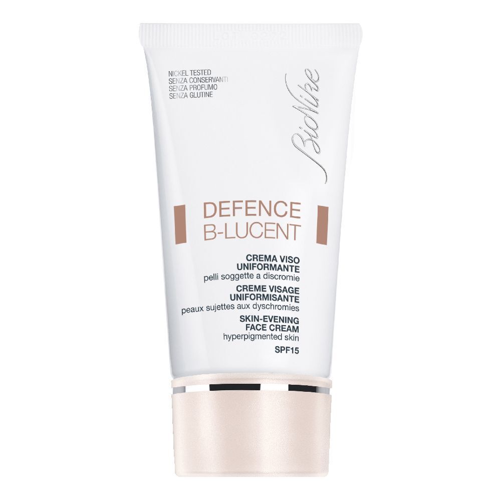 Tube blanc avec DEFENCE B-LUCENT. Crème visage avec SPF 15. Marque : BioNike. Texte en italien et anglais.