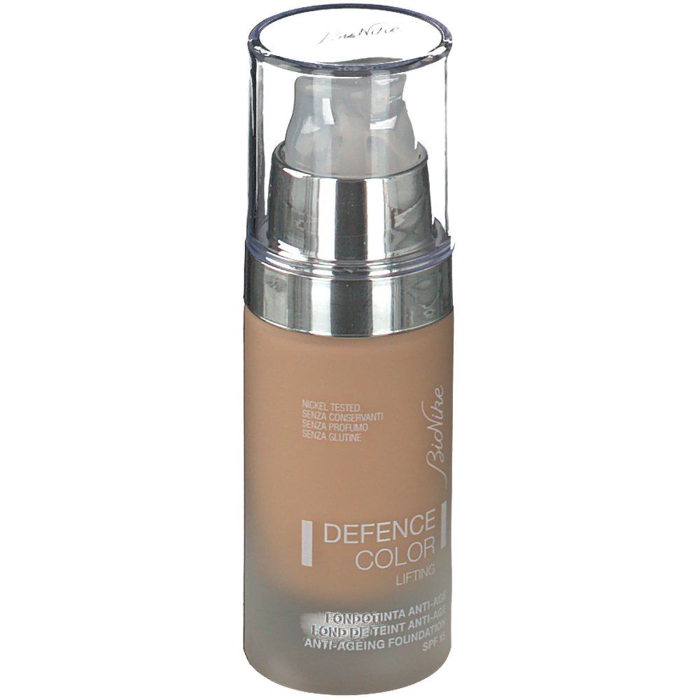 Fond de teint lifting BioNike Defence Color, beige. Flacon en verre. Pompe. Texte.