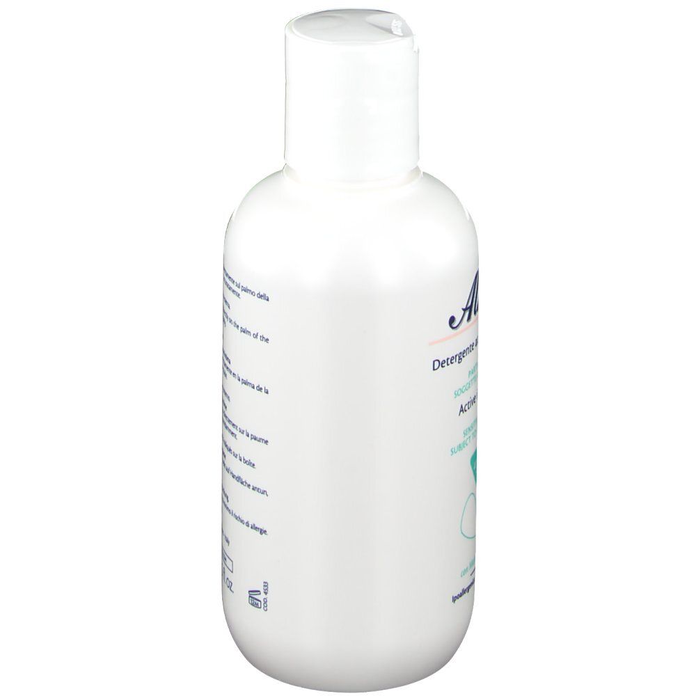 Flacon blanc avec bouchon rabattable. Inscription Alkagin. Texte en italien. 250 ml.
