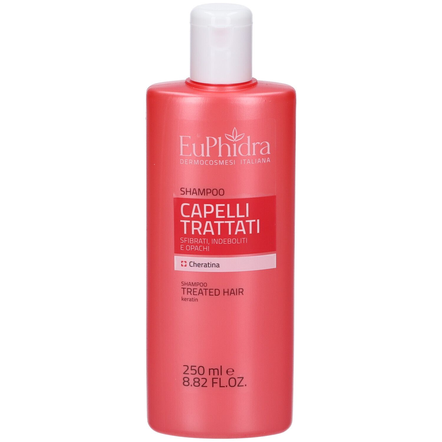 Flacon de shampooing rouge avec bouchon blanc. Étiquette avec texte: EuPhidra, Shampooing, Capelli Trattati, Kératine. 250 ml.