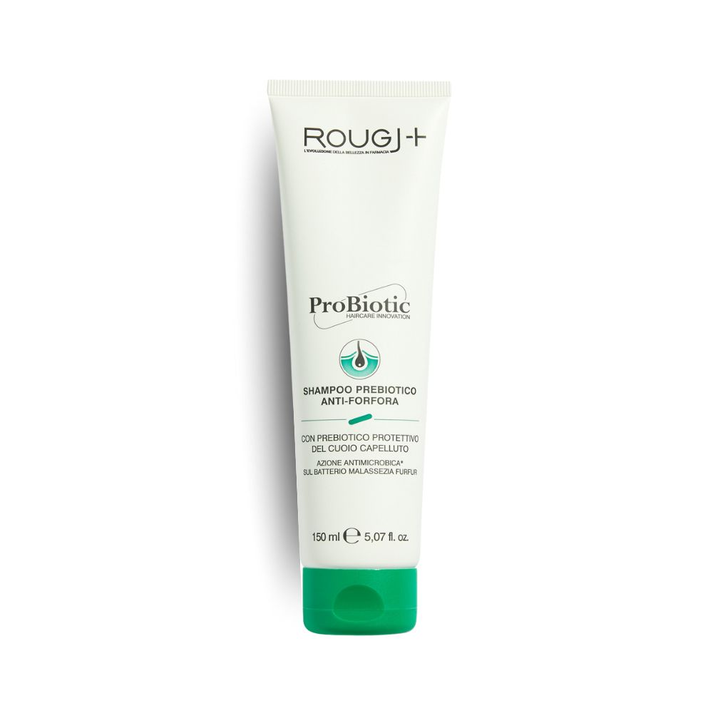 Tube blanche, bouchon vert. Inscription: ROUGJ+, ProBiotic, Shampooing antipelliculaire. Volume: 100 ml.