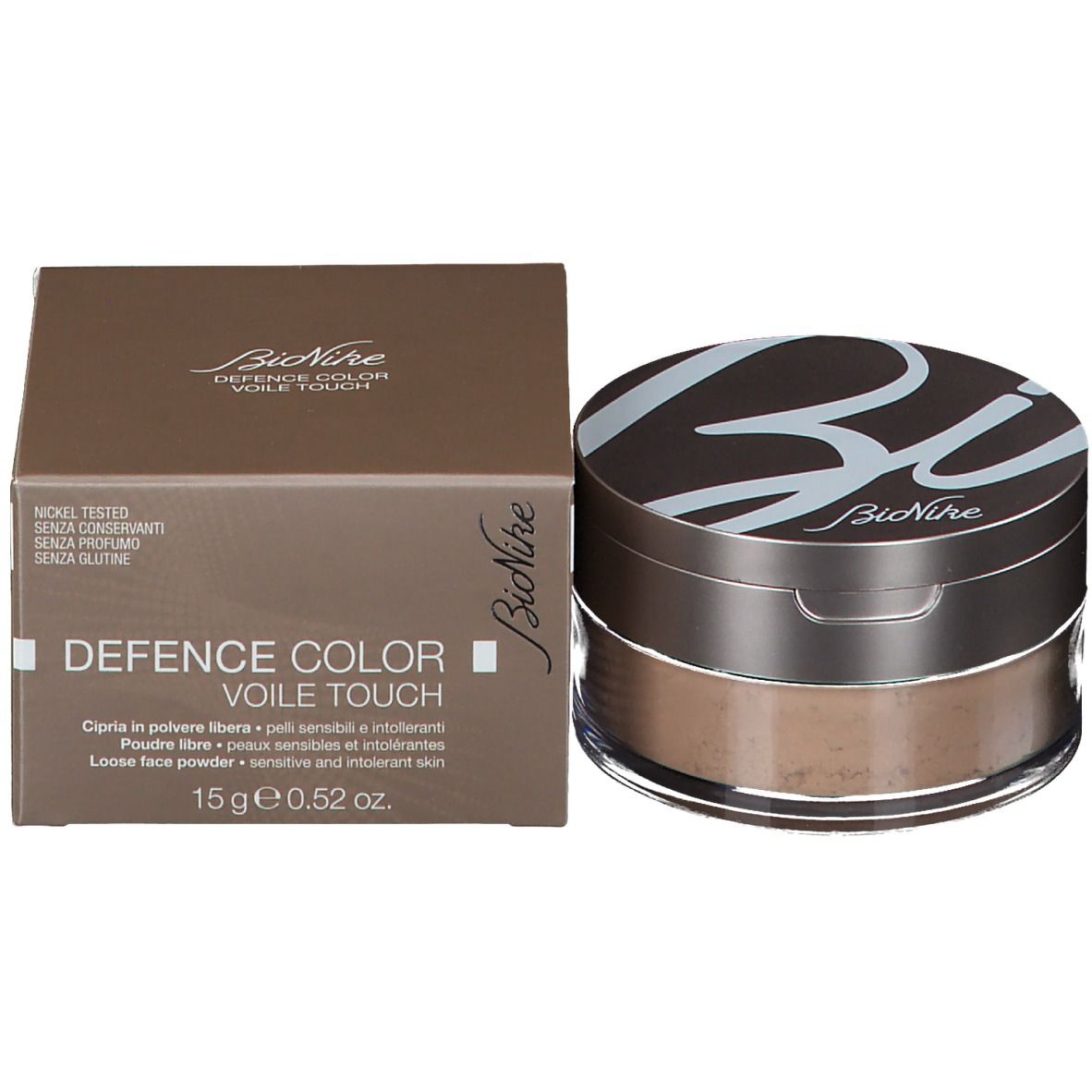 Poudre BioNike Defence Color Voile Touch. Pot et emballage. Texte sur l'emballage. Couleur marron.