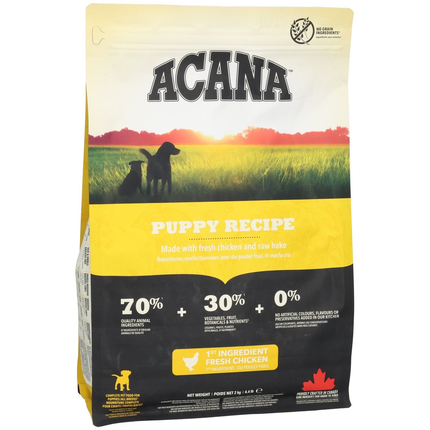Sac ACANA Puppy Recipe. Design jaune et noir avec silhouette de chiots. Contient 70% d'ingrédients animaux, 30% de légumes, fruits, 0% d'additifs artificiels.