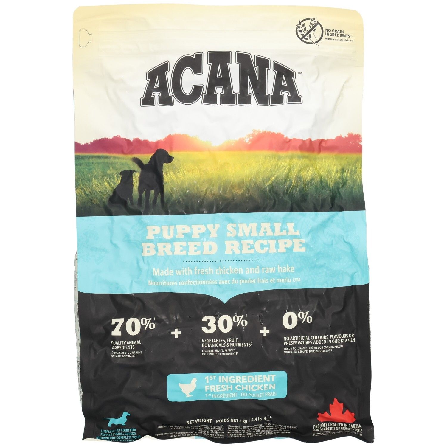 ACANA Puppy Small Breed Recipe nourriture pour chien : Façade avec image de deux chiens au coucher du soleil et caractéristiques du produit.