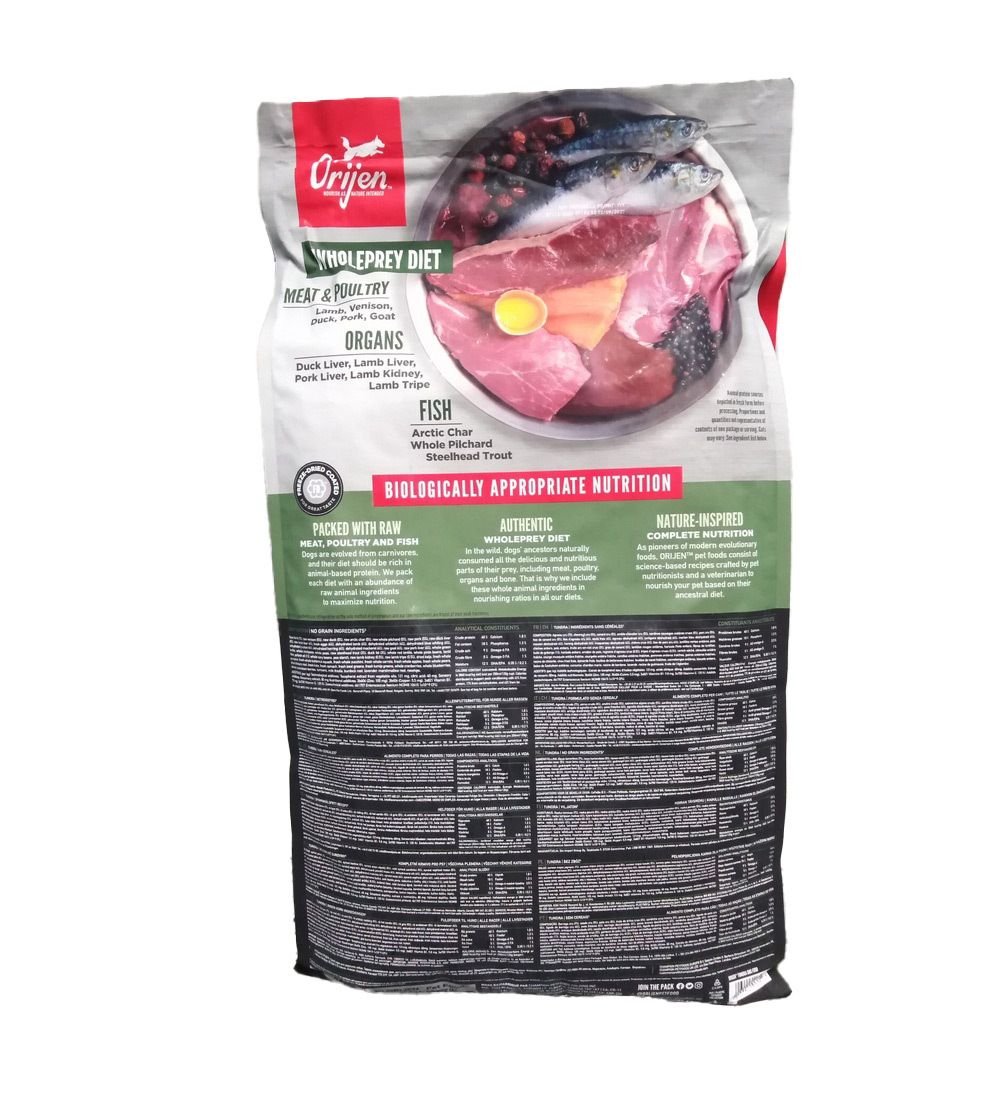 Dos du sac de nourriture pour chiens Orijen. Inscription Wholeprey Diet, viande et volaille, organes, poisson. Liste des ingrédients.