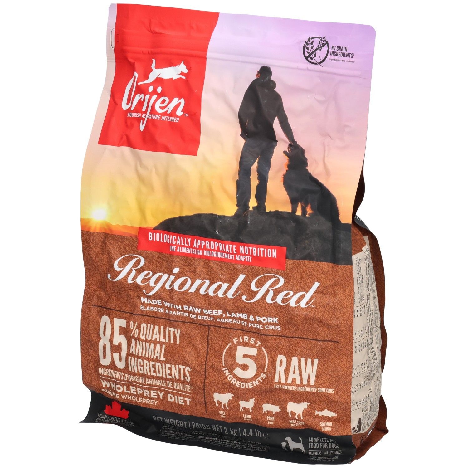 Sac ORIJEN DOG REGIONAL RED. Inscription "Regional Red", 85% ingrédients animaux. Image d'un homme et d'un chien.
