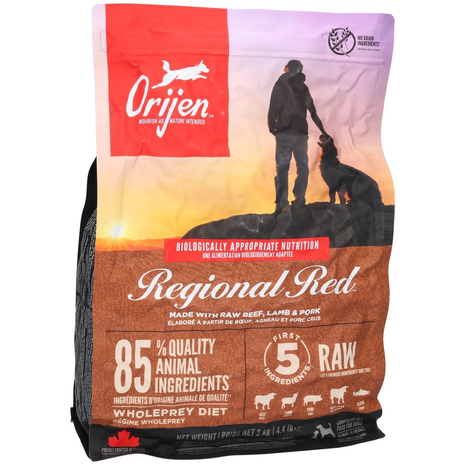 Sac ORIJEN DOG REGIONAL RED. Inscription "Regional Red", 85% ingrédients animaux. Image d'un homme et d'un chien.